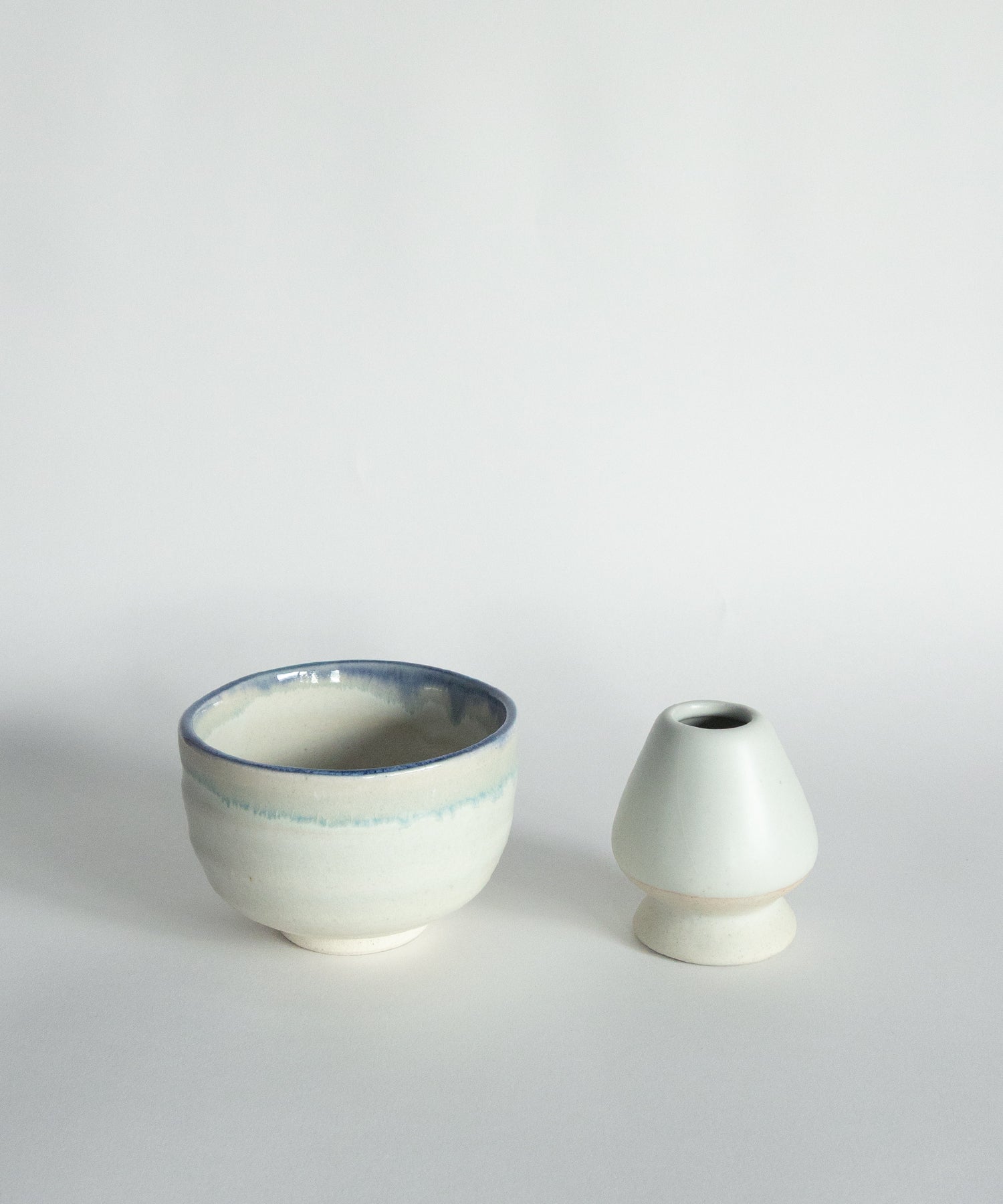 Handcrafted Japanese Mino matcha bowl and ceramic whisk holder set in white blue rim glaze, limited edition matcha tools UK