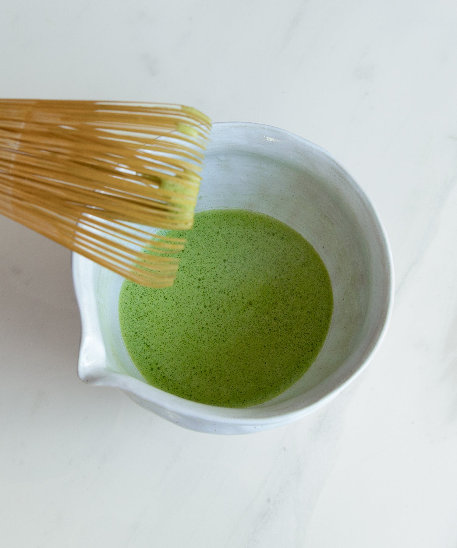 Matcha Whisk Set featuring handmade ceramic bowl, bamboo whisk.